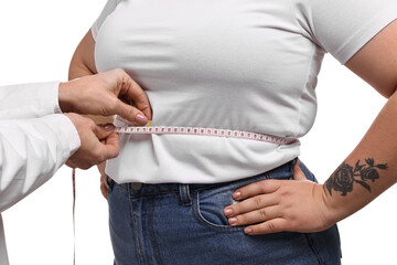 Weight loss. Nutritionist measuring patient's waist with tape on white background, closeup