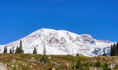 Washington State, Mount Rainier National Park. Mount Rainier with a covering of new autumn snow