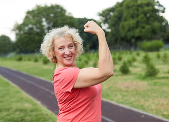 woman sport mature fitness healthy exercise happy fit strong muscle active old training outdoor...