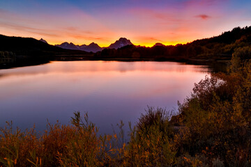 USA, Wyoming. Grand Tetons National Park and sunset Oxbow Bend