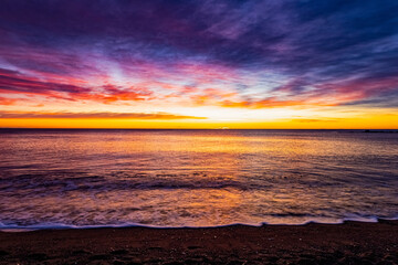 Beautiful sunrise on the Mediterranean Sea. Winter Barcelona. Spain in January.