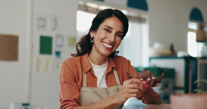 Face, pottery and woman in studio, clay and happiness with startup, creativity and craftsmanship. Portrait, entrepreneur and artist in workshop, material and skills for ceramic project and handmade