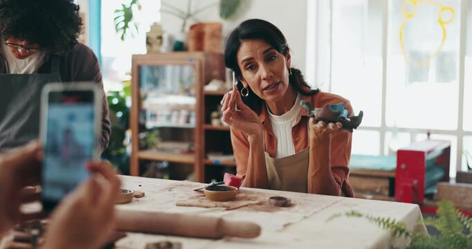 Woman, pottery or recording in studio for tutorial, sculpting lesson and creative online course. Artist, class and phone in startup for live streaming, ceramic broadcast and social media interaction