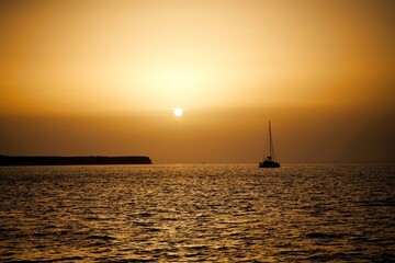 fishing boat at sunset