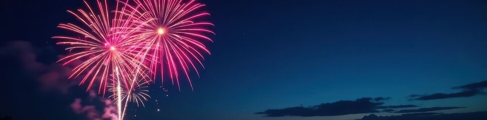 Fototapeta premium Vibrant fireworks explode against a deep blue night sky , night photography, dark