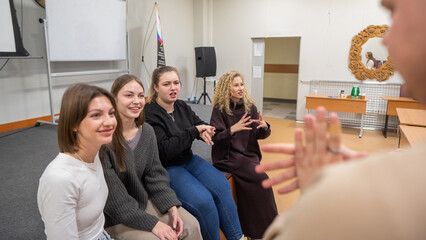 Students learn sign language at university. 