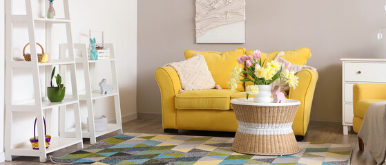 Modern living room with beautiful tulips decorated for Easter celebration