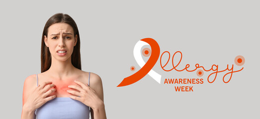 Young woman with red sunburned skin on grey background