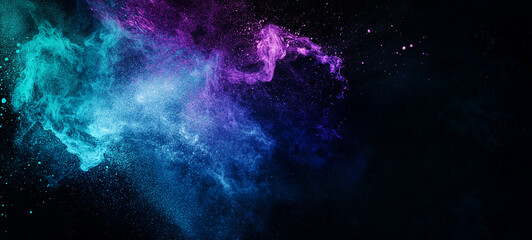 Fototapeta premium A black background featuring a gradient of blue, purple, and teal, creating a vibrant effect.