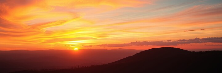 Fototapeta premium Sunset over mountains with a tranquil mood representing nature's beauty against a colorful sky