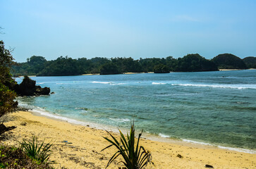Crystal-Clear Water Lapping onto a White Sandy Shore
