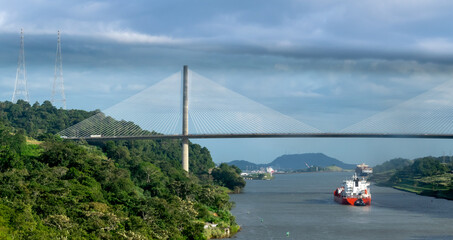 The Centennial Bridge, part of the Pan-American Highway, crosses the Culebra Cut (Gaillard Cut) near the Pedro Miguel Locks of the Panama Canal..