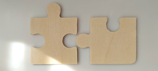 Obraz premium Puzzle pieces aligning together minimalist studio photograph modern design close-up creativity and problem solving