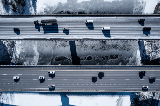 Aerial view of highway 93 crossing over the frozen Merrimack River in winter 
-Hooksett, New Hampshire
