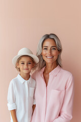 A woman and a child are posing for a picture