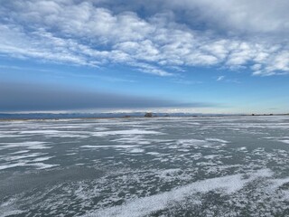 blue sky over ocean waves