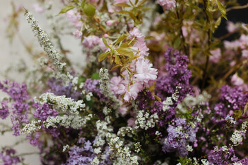 Vibrant floral arrangement with pink and purple blossoms displayed in a stylish setting
