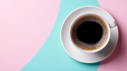 A top-down view of a cup of coffee on a pastel-colored background.