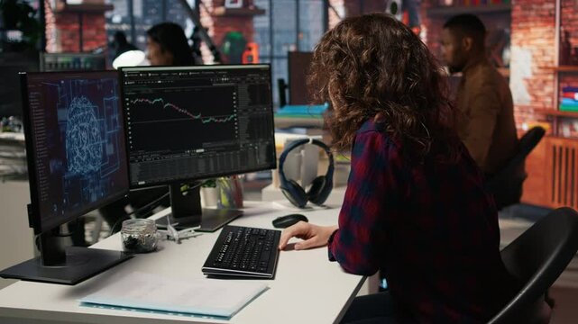 Startup manager delighted by successful IPO, watching live market updates showing stocks raising. Venture team leader happy after becoming publicly traded company, giving good news to team, camera A
