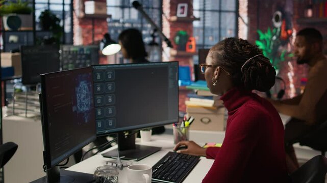 Silicon Valley venture programmer solving tasks with AI LLM chatbot using predictive technology. African american startup IT worker using PC to interact with generative model, camera A