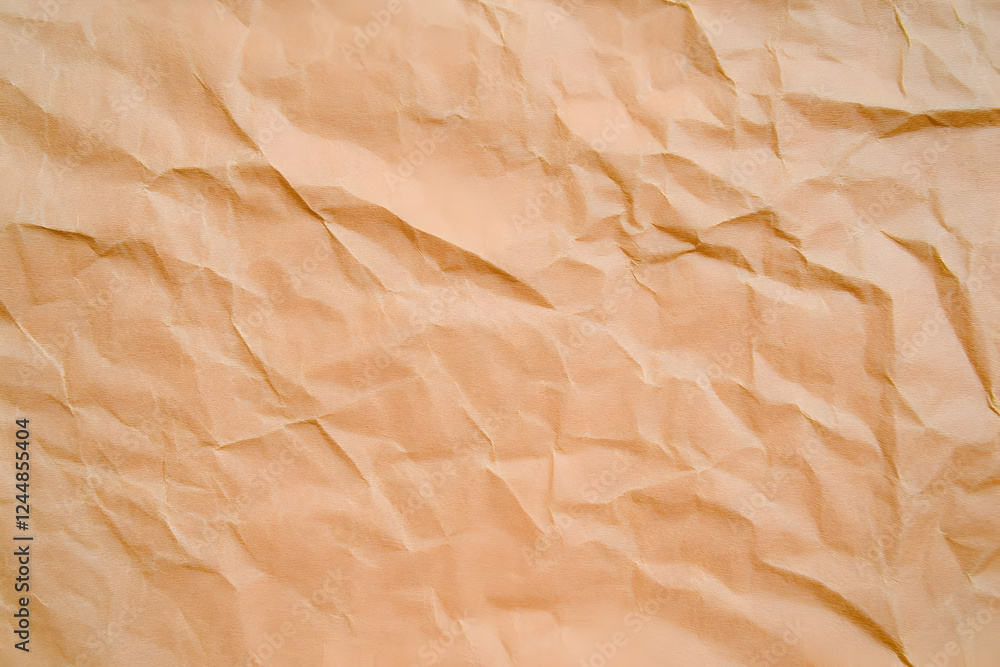 Poster crumpled light brown paper texture forms abstract background for design projects.