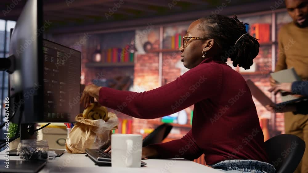 Poster it employee using programming languages on pc in ai startup office to build applications, enjoying s