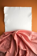 Wrinkled paper waits quietly on a smooth surface, touched by gentle light