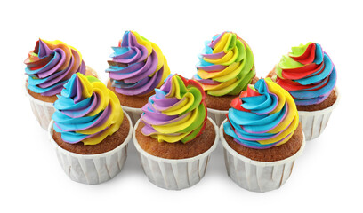 Tasty cupcakes with colorful cream isolated on white