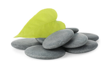 Spa stones with leaf isolated on white