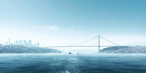 Fototapeta premium Majestic View of the Bosphorus Bridge Across the Expansive Sea with Clear Blue Sky, Boats Underneath and Istanbul’s Skyline in the Distance.