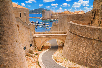 Summer cityscape - view of the bridge between the Revelin Fortress and the Ploce Gate in the Old...