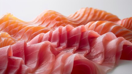 Showcase an artistic display of thinly sliced sushi-grade tuna and salmon, overlapping slightly to form a graceful wave pattern.