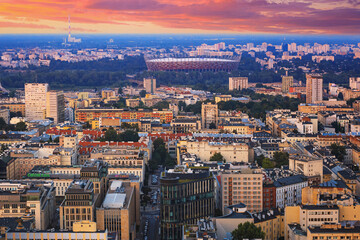 Cityscape at sunset - top view of central Warsaw, the municipal neighbourhood of Centrum, located within the Srodmiescie district in Warsaw, Poland