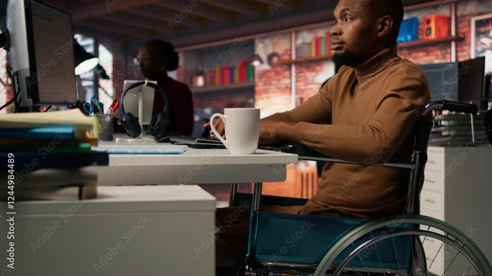 Poster man in wheelchair working in inclusive ai tech agency providing software development services. it wo