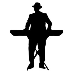 silhouette of person playing keyboard while standing