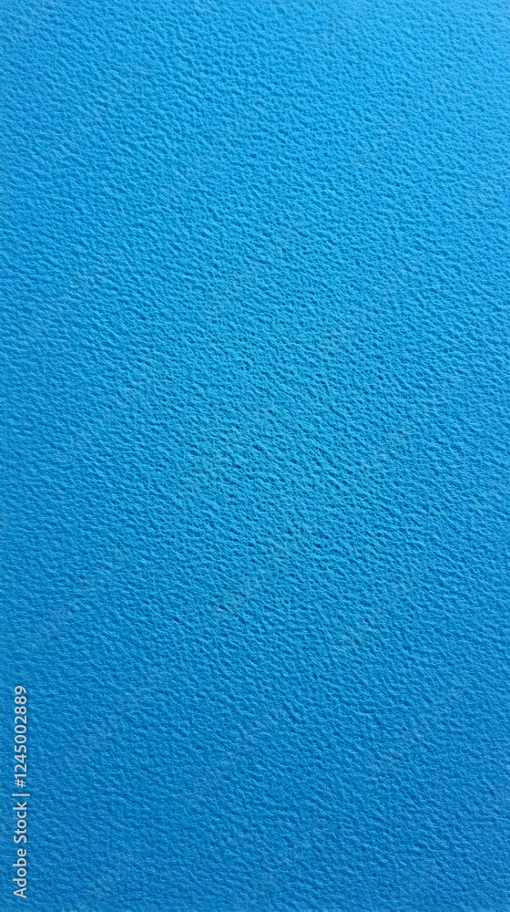 Poster close-up of a vibrant blue textured surface creates an abstract background suitable for design proje