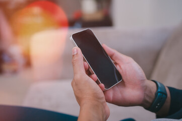 Social media marketing concept. businessman hand using smartphone typing, chatting conversation in chat box icons pop up, Customer service evaluation by using phone give feedback