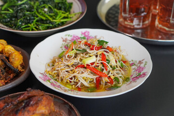 Flavorful Indonesian cuisine rich in spices, captured on February 6, 2025. The vibrant colors and aromatic ingredients create a delicious and authentic culinary scene