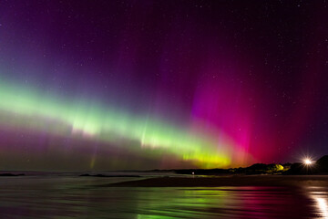 The stunning Southern Lights (aurora australis) over Dunedin, Otago Region, New Zealand.