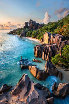 Woman at Anse Source d'Argent at sunset, Seychelles