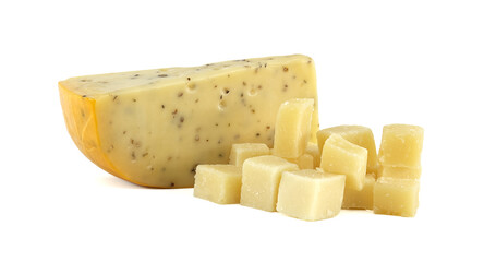 Piece of cumin cheese with cubes showing its texture on white background