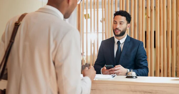 Man, client and card for payment at hotel accommodation, hospitality service and business booking. People, pos machine and receptionist for checkout transaction, concierge helping and finance support