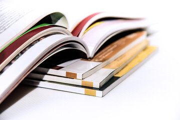 stack of magazines open