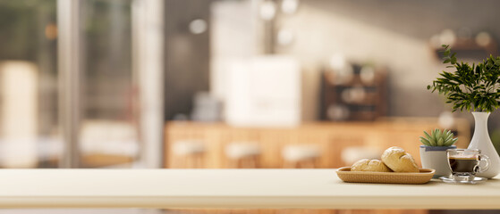 A minimalist white kitchen tabletop set in in a minimalist kitchen or coffee shop.