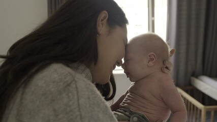 Home, mother and baby with love, family and bonding with child care, relationship and loving. Mama, infant or female parent with a newborn, hug or cuddle with rest, affection or happiness with health