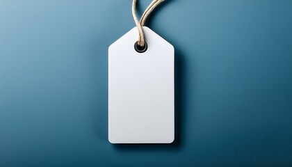 Blank price tag. A blank white tag with a string, perfect for labeling items or gifts in various creative 