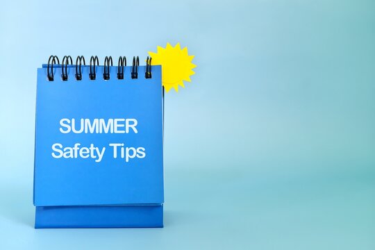Summer safety tips reminder concept. Desk note in blue background.