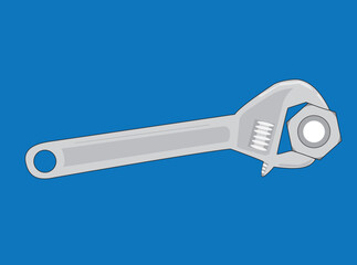 レンチでナットを締めている