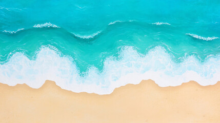 Aerial view of turquoise waves gently crashing onto sandy beach, creating serene coastal scene