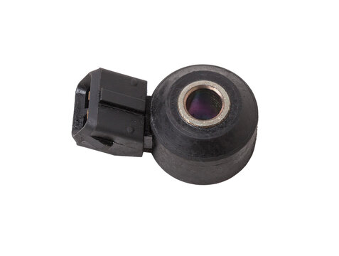 Knock sensor for vehicle engines spare parts electrical parts sensors on white background copy space